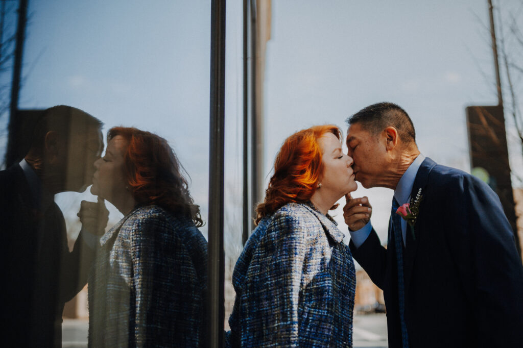 Couple kisses after Downtown Frederick Elopement